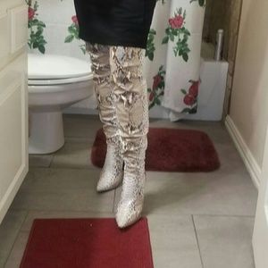 Snake skin thigh high stallito boots